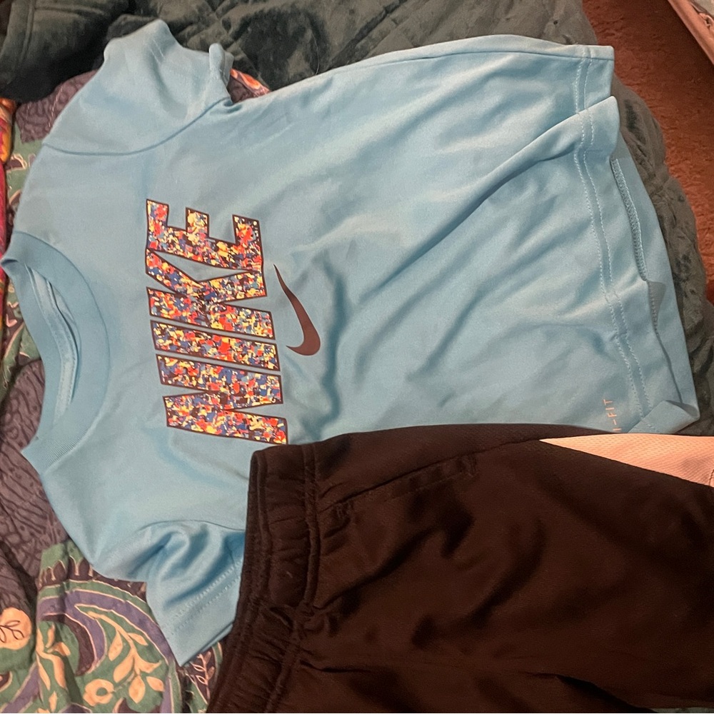 Boy toddler Nike shirt and garanimals shorts.